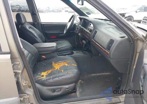 1997 Jeep Grand Cherokee Laredo/Tsi из США, поврежденный, VIN 1J4FX58S1VC735403